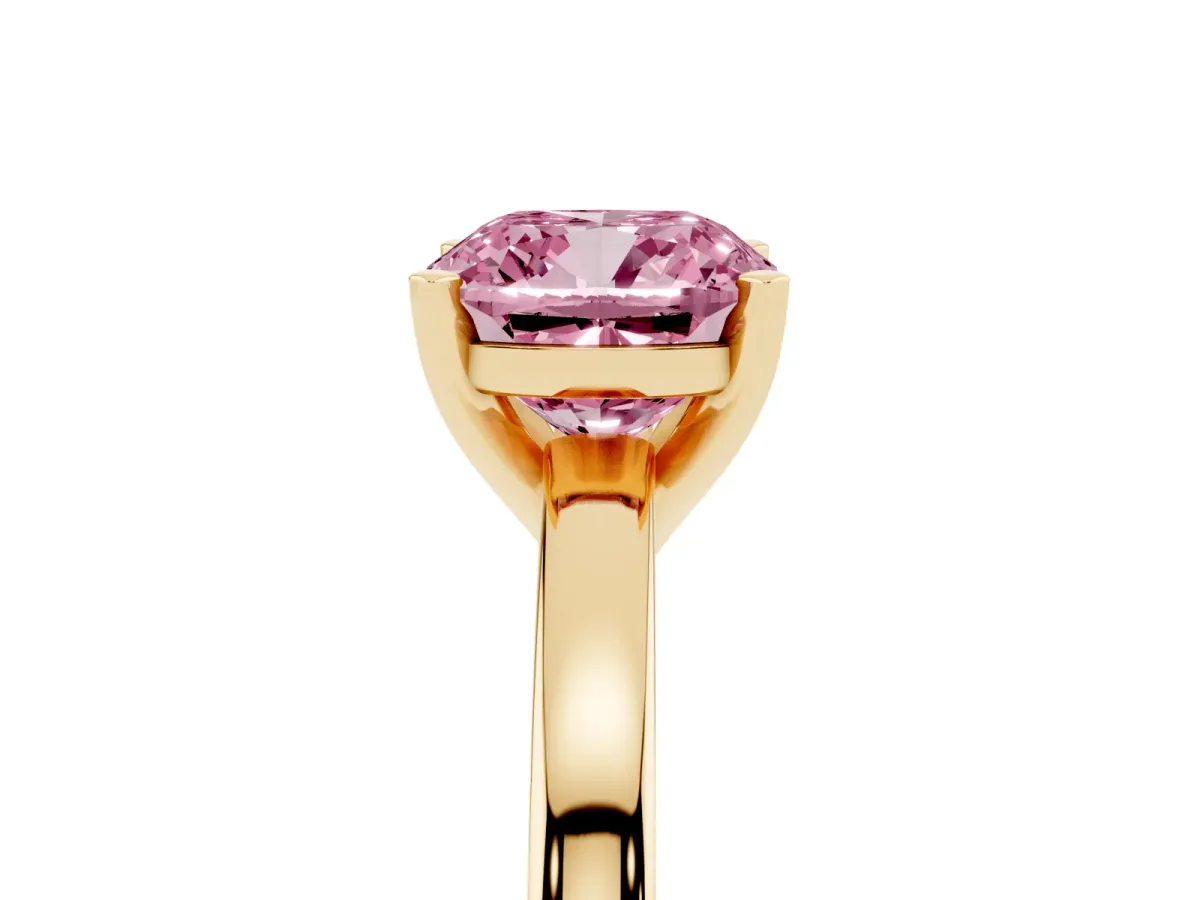 Fancy Pink Cushion Cut Solitaire Diamond Engagement Ring with Four-Prong Setting on a Classic Band Yellow gold