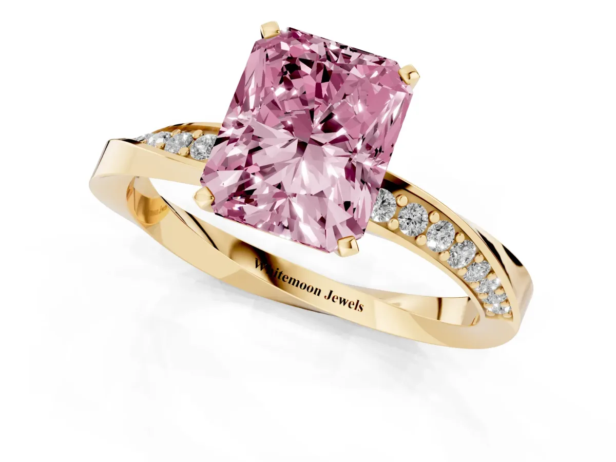 Fancy Pink Radiant Cut Diamond Engagement Ring with Side Stone Accents and Four-Prong Setting Yellow gold