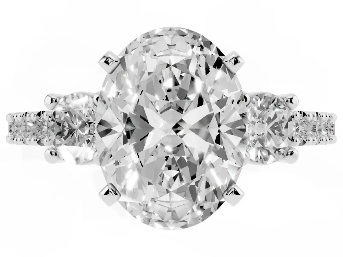 Oval Cut Three-Stone Diamond Pavé Band with Prong Setting Platinum