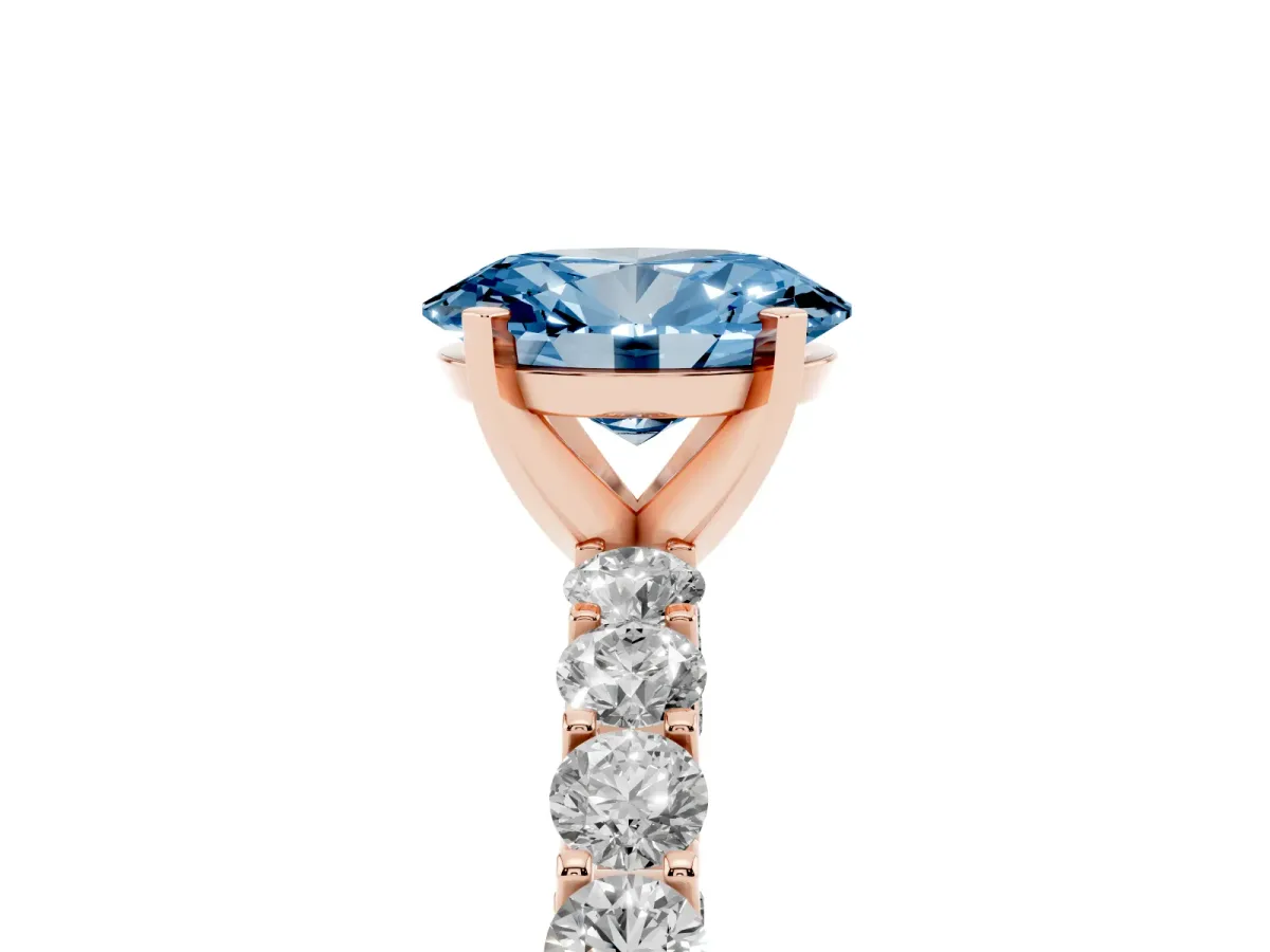 Fancy Blue Oval Cut Diamond Solitaire Ring with Shared Prong Pavé Band and Four-Prong Setting Rose gold