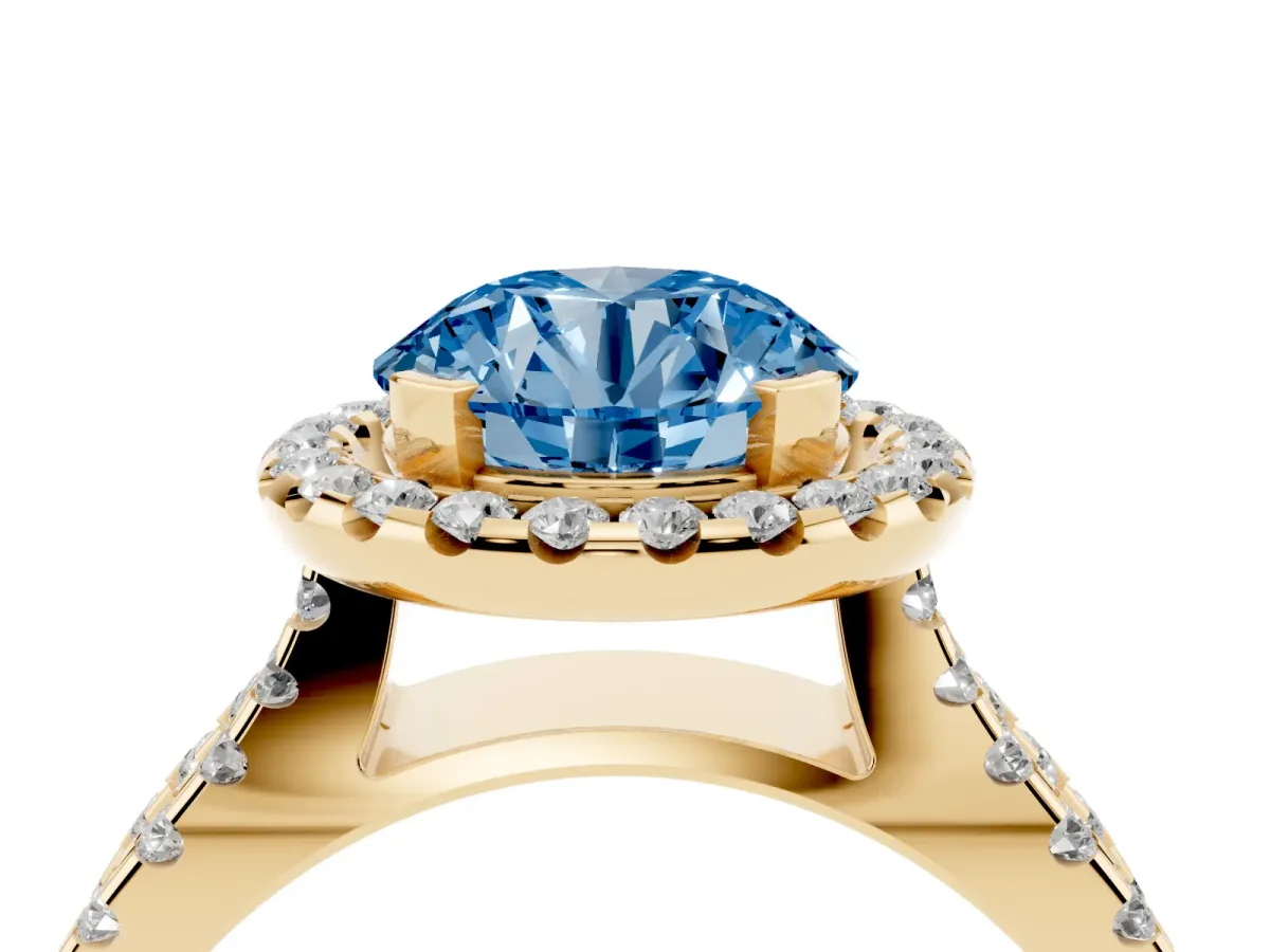 Fancy Blue Round Cut Diamond Halo Ring with Split Shank Pavé Band and Prong Setting Yellow gold