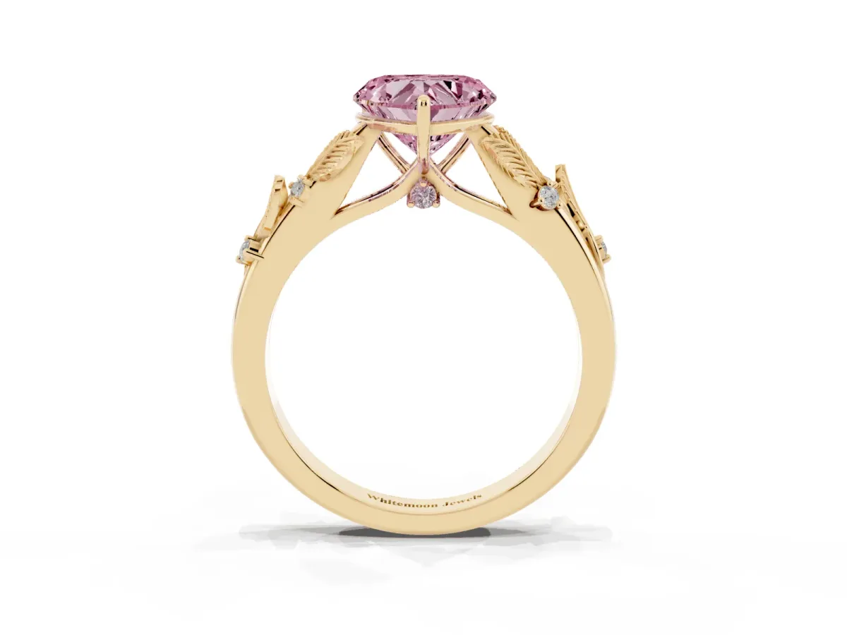 Fancy Pink Heart Cut Diamond Solitaire Ring with Leaf Motif Band and Four-Prong Setting Yellow gold