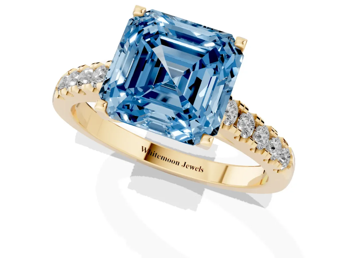 Fancy Blue Asscher Cut Diamond Pavé Band Solitaire Ring with Prong Setting Yellow gold