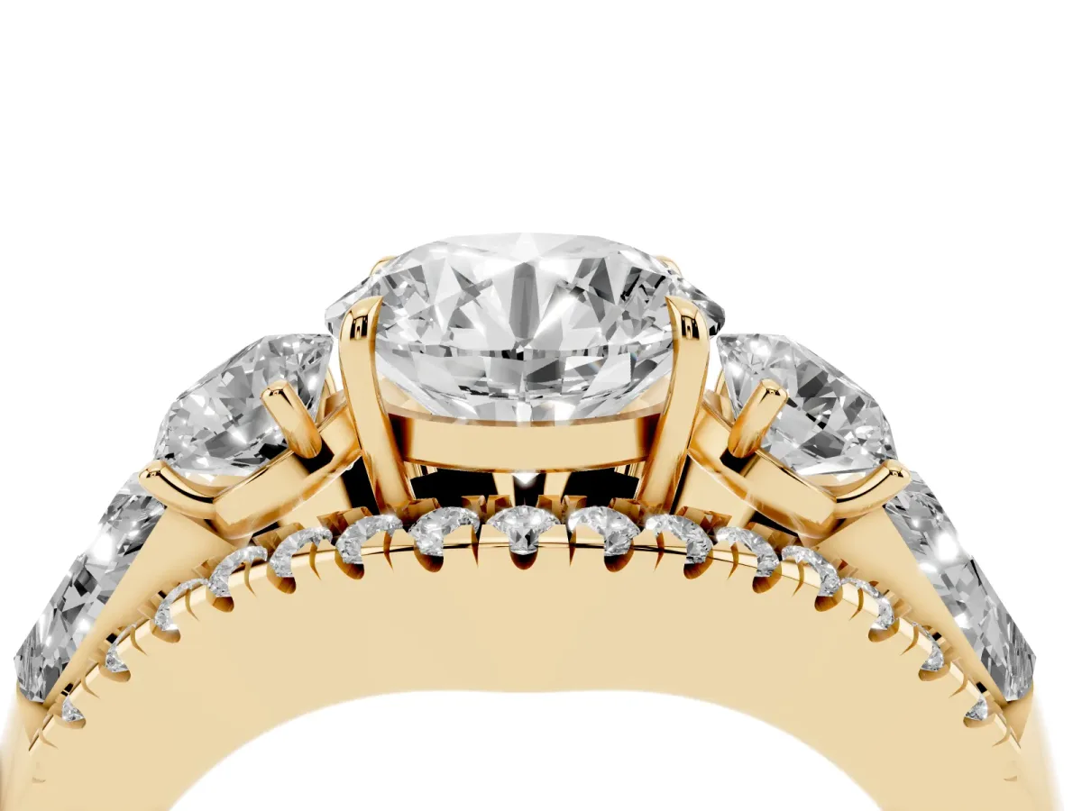 Three-Stone Round Cut Diamond Engagement Ring with Pave Band and Prong Setting Yellow gold