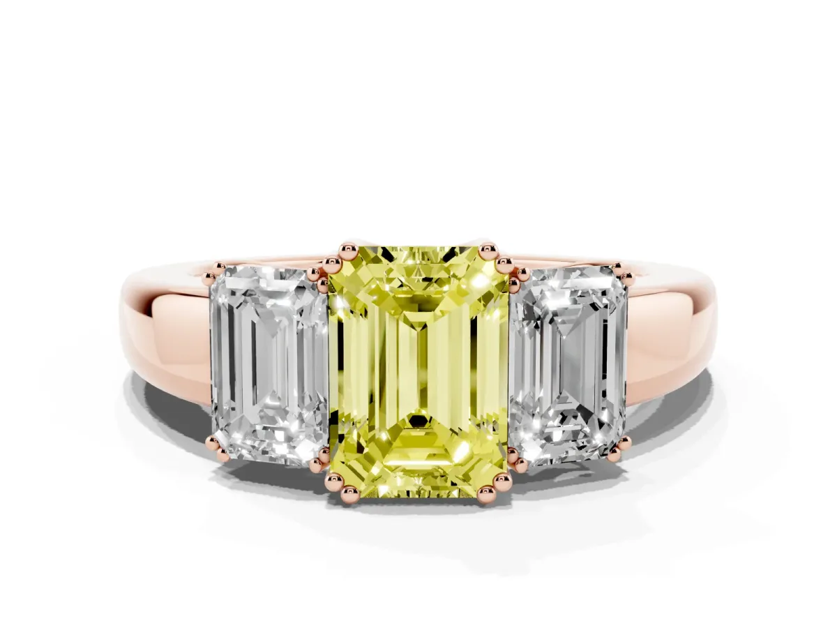 Fancy Yellow Three-Stone Emerald Cut Cut Diamond Ring with Channel Set Band and Four-Prong Setting Rose gold