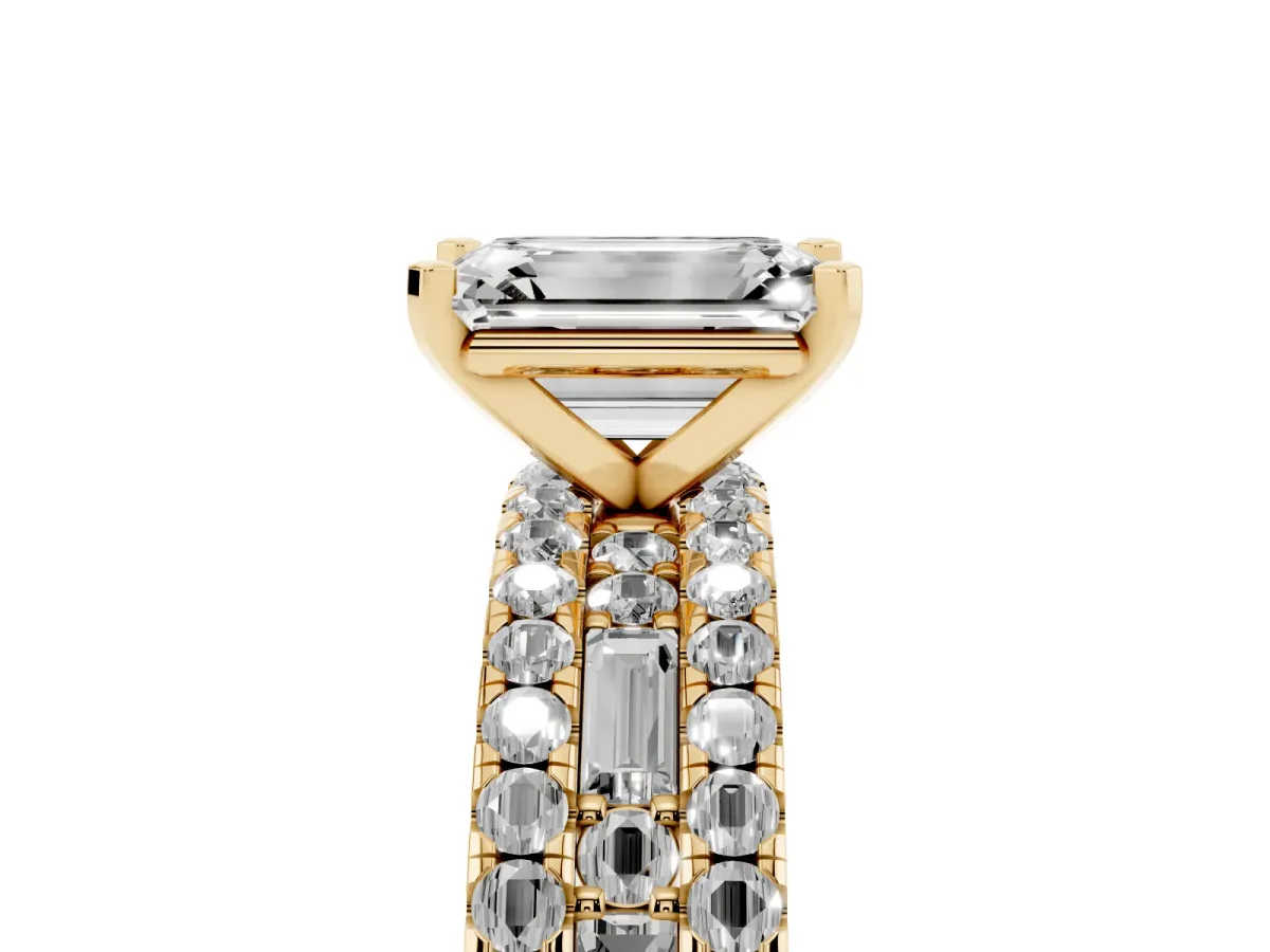Emerald Cut Diamond Solitaire Ring with Pavé and Channel Set Band Yellow gold