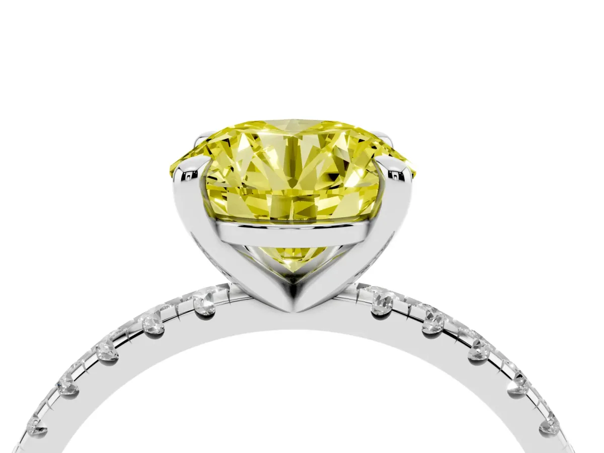 Fancy Yellow Round Cut Diamond Brilliant Solitaire Ring with Pavé Band and Four-Prong Setting White gold