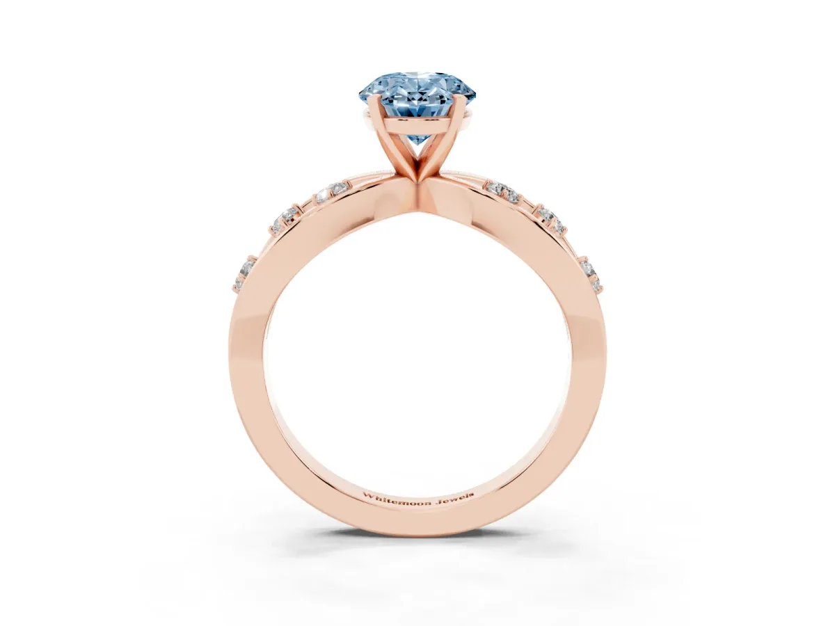 Fancy Blue Oval Cut Cut Solitaire Diamond with Side Stones on Criss-Cross Band and Four-Prong Setting Rose gold