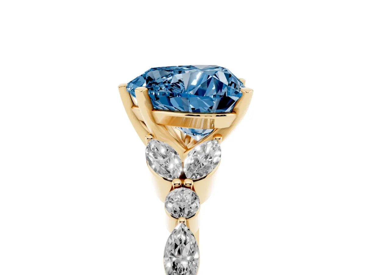 Fancy Blue Heart Cut Diamond Solitaire Ring with Side Stones and Four-Prong Setting Yellow gold