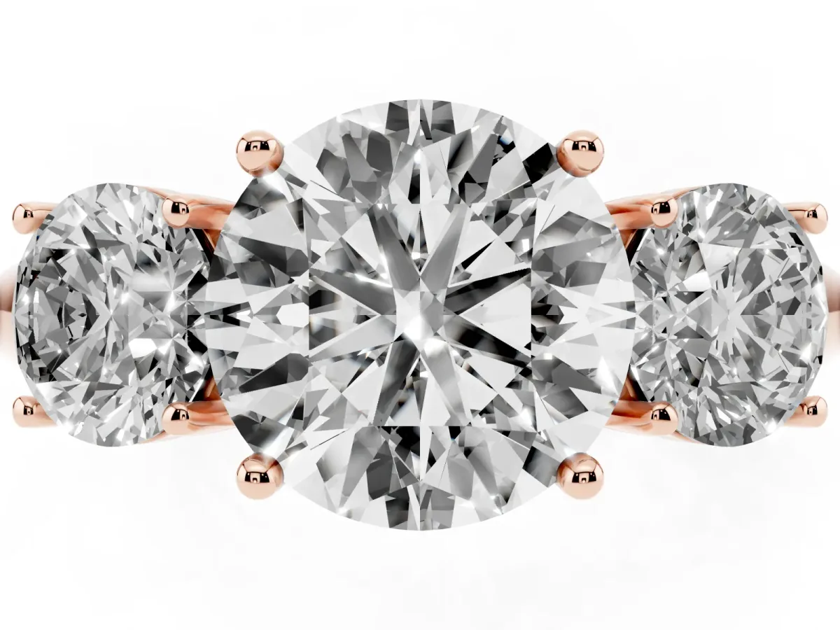Three-Stone Round Cut Cut Diamond Engagement Ring with Prong Setting on a White Gold Band Rose gold