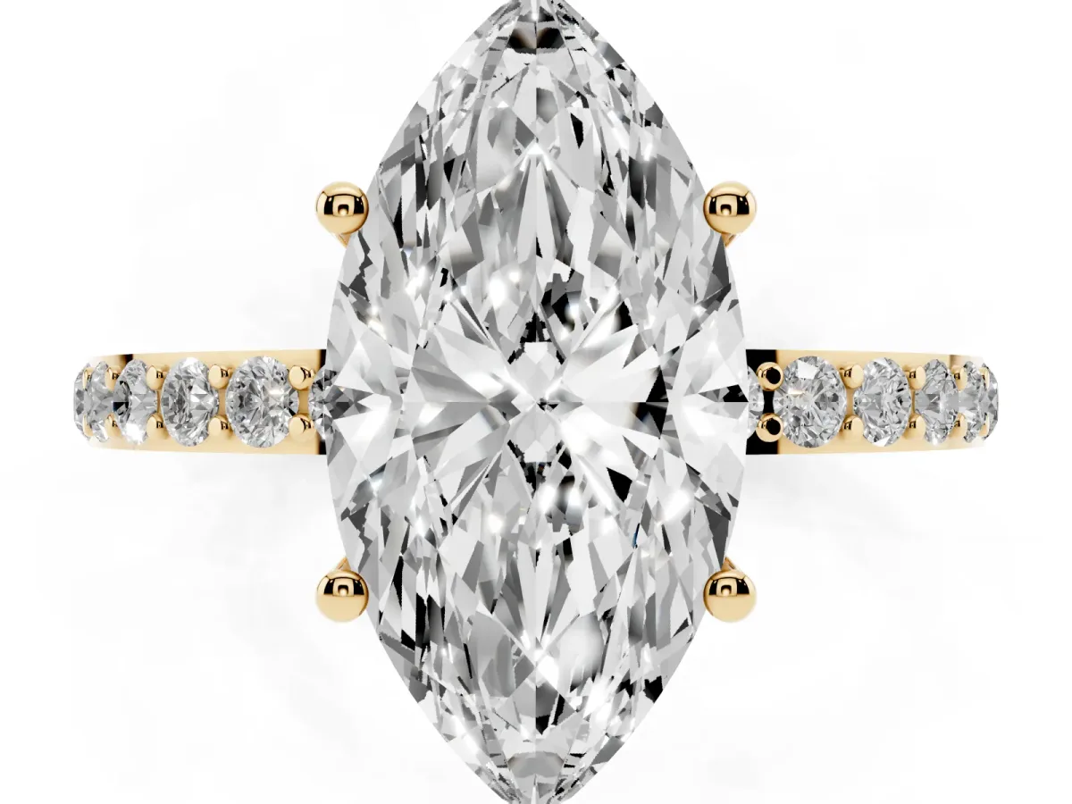 Marquise Cut Diamond Solitaire Ring with Round Pavé Shoulders and Prong Setting Yellow gold