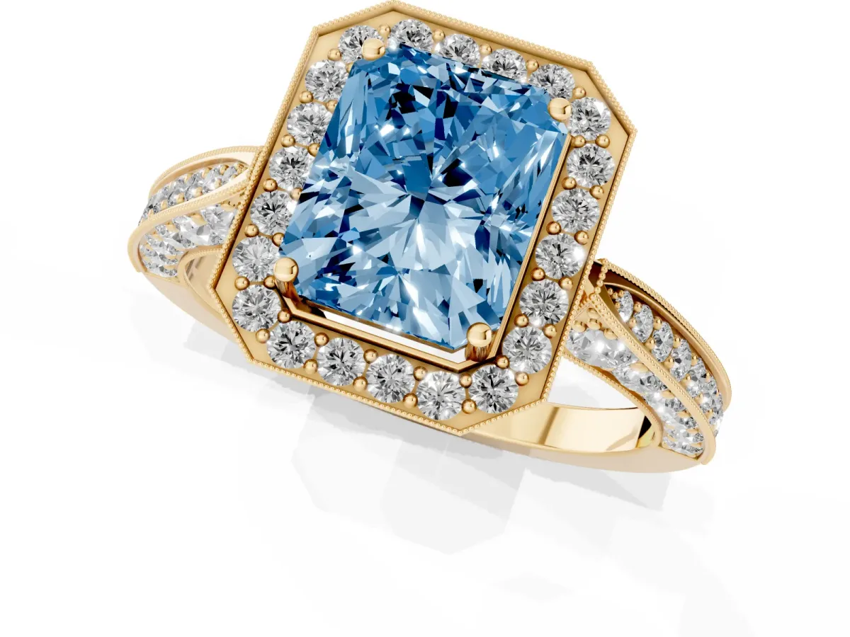 Fancy Blue Radiant Cut Halo Diamond Engagement Ring with Split Shank Band and Four-Prong Setting Yellow gold