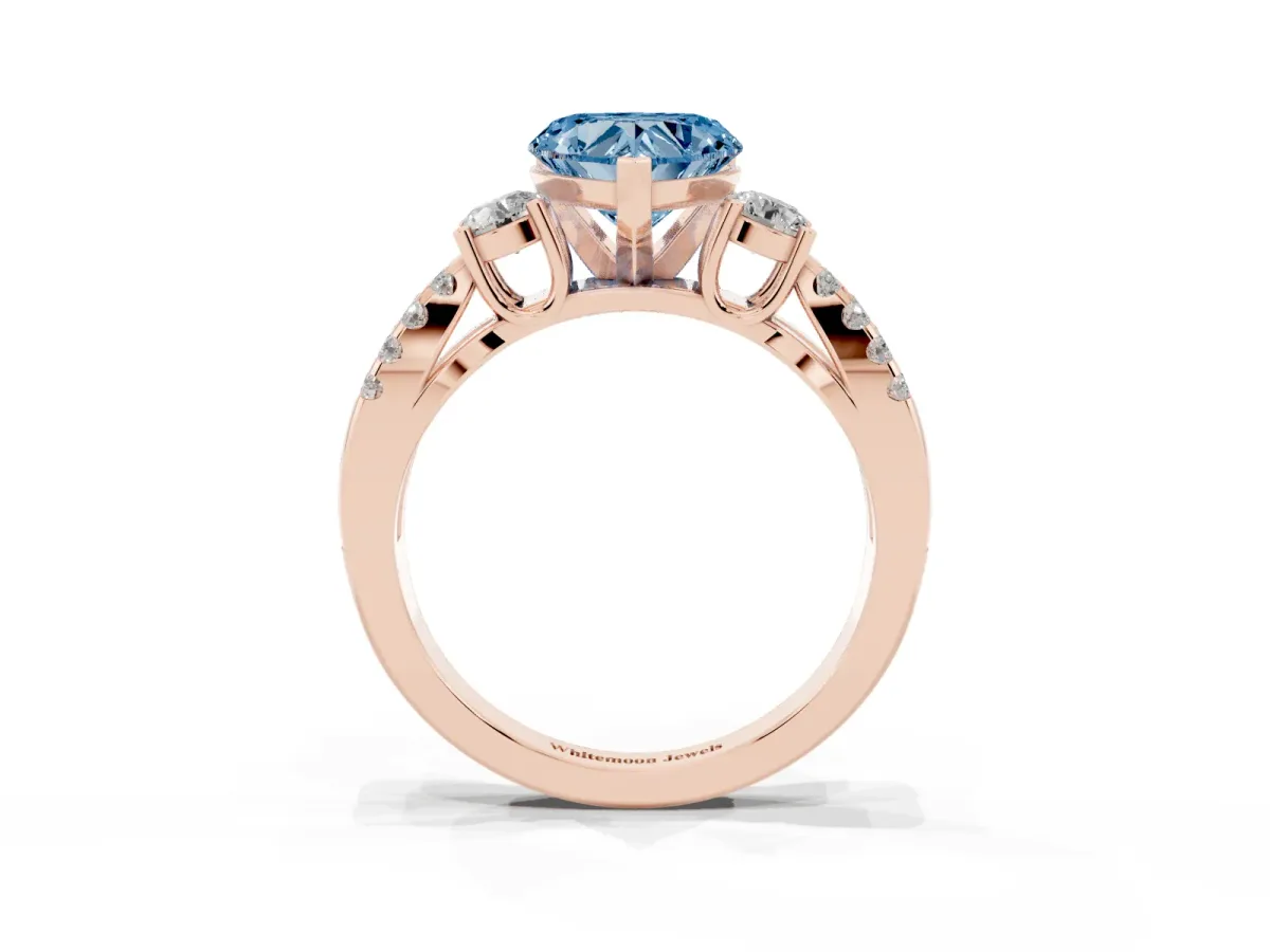 Fancy Blue Heart Cut Diamond Three-Stone Ring with Pavé Split Shank and Four-Prong Setting Rose gold
