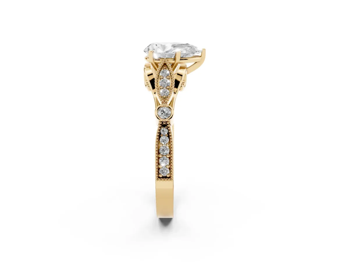 Pear Cut Cut Diamond with Milgrain Marquise and Bezel Accents on a Solitaire Band with Prong Setting Yellow gold