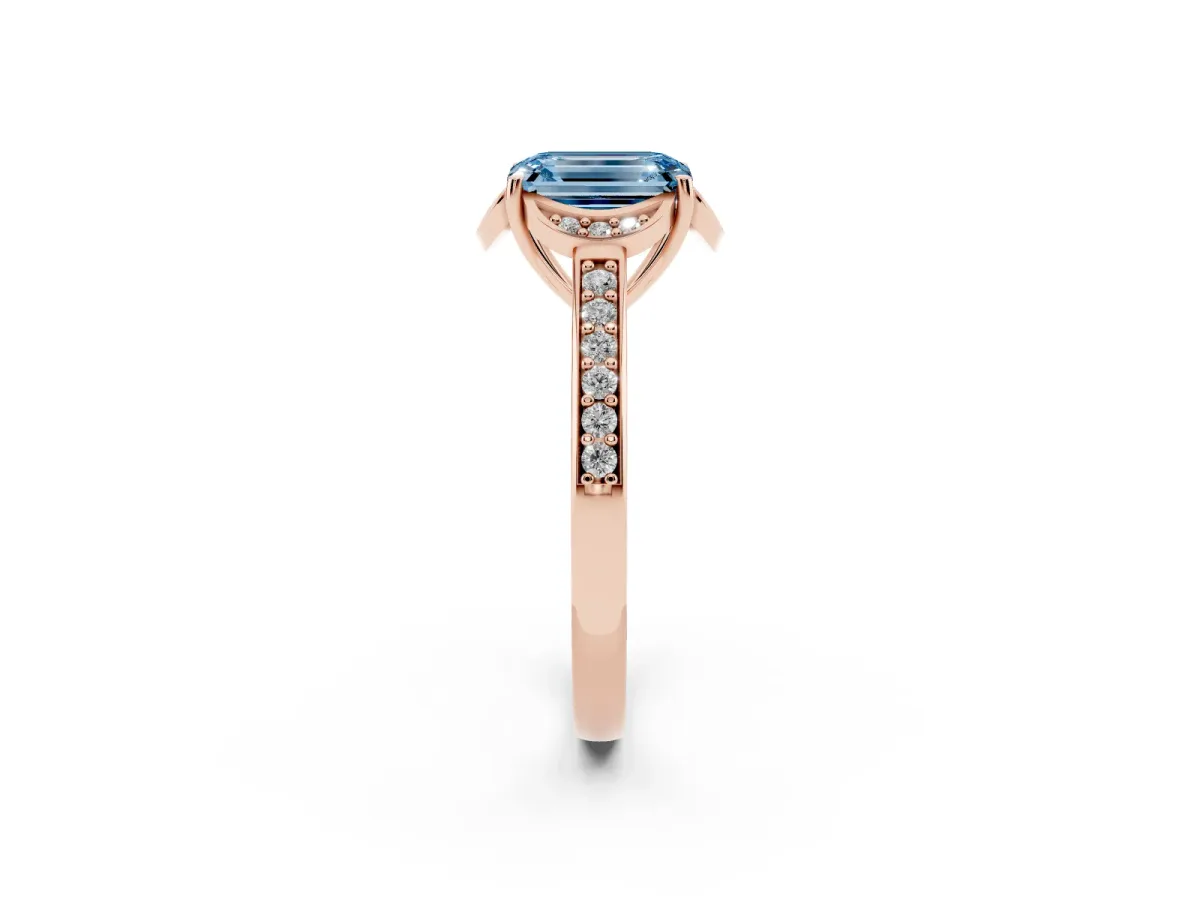 Fancy Blue Emerald Cut Cut Halo Diamond Ring with Channel Set Band and Four-Prong Setting Rose gold