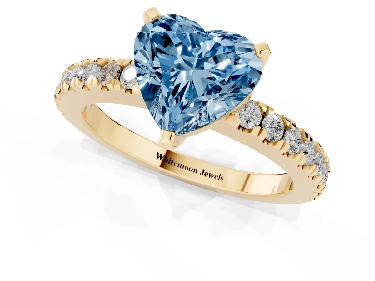 Fancy Blue Heart Cut Solitaire Diamond with Pavé Band and Four-Prong Setting Yellow gold