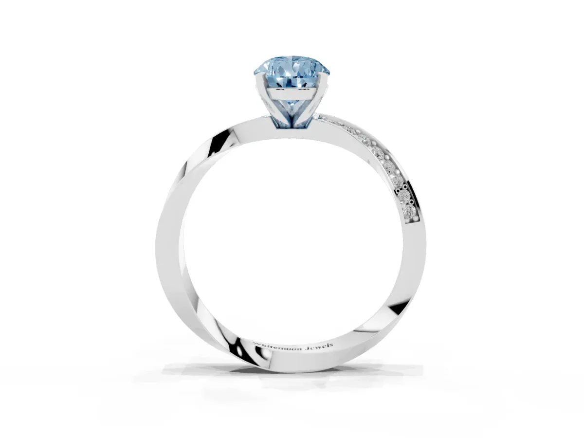 Fancy Blue Pear Cut Diamond Engagement Ring with Side Stone Accents and Four-Prong Setting Silver