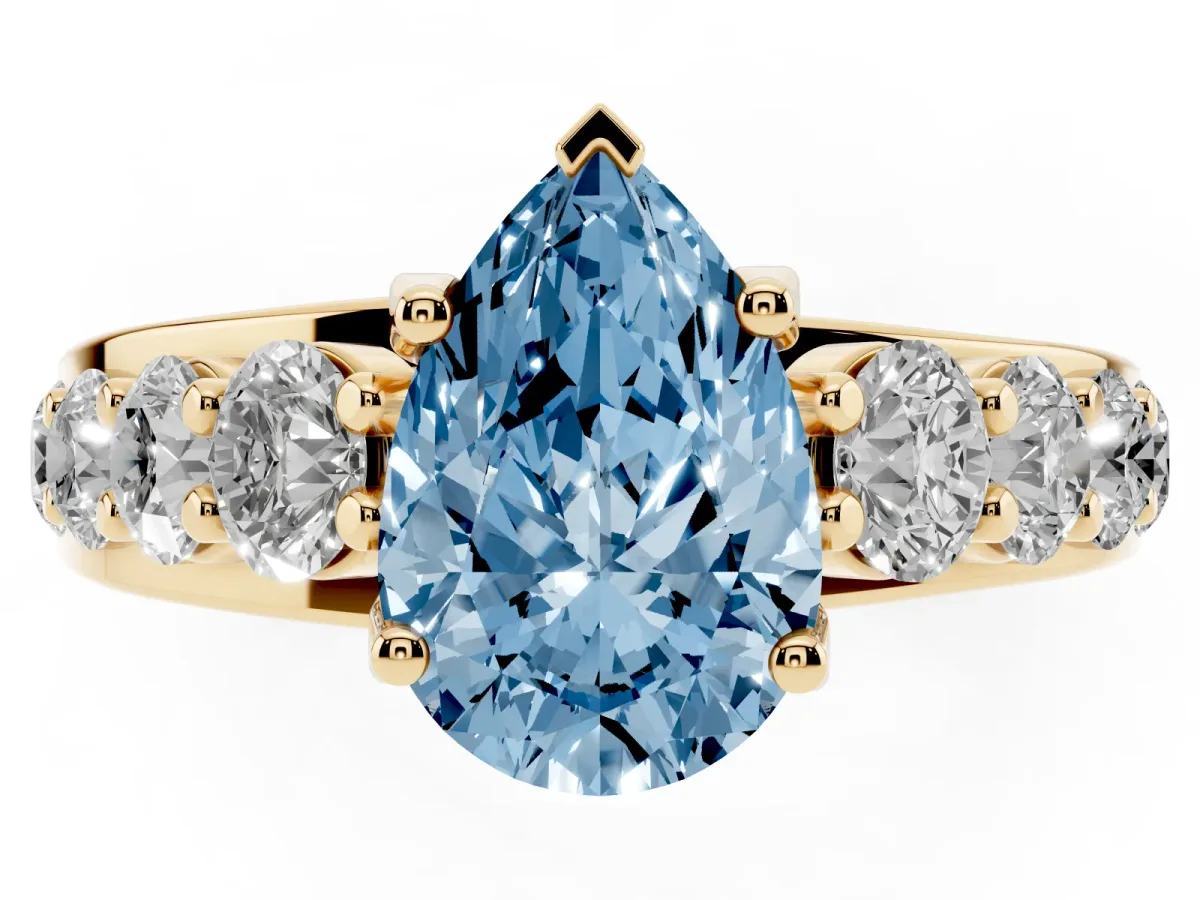 Fancy Blue Pear Cut Diamond Engagement Ring with Pavé Band and Four-Prong Setting Yellow gold