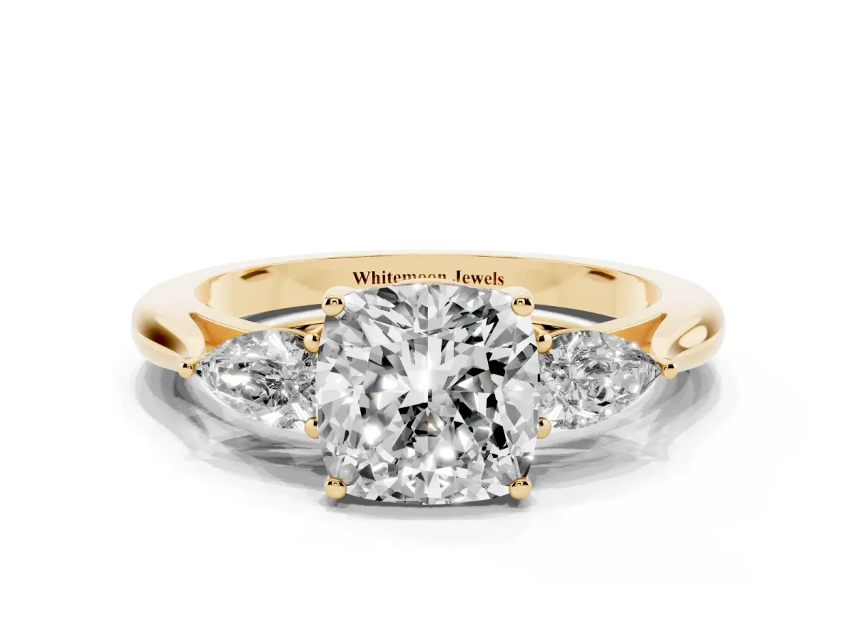 Three-Stone Cushion Cut Brilliant Diamond Solitaire Ring with Tapered Band and Four-Prong Setting Yellow gold