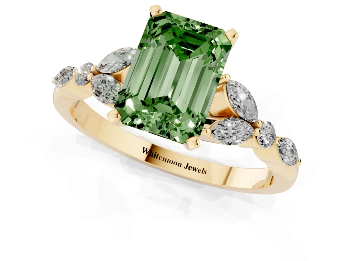 Fancy Green Emerald Cut Diamond Solitaire Ring with Side Stones and Four-Prong Setting Yellow gold