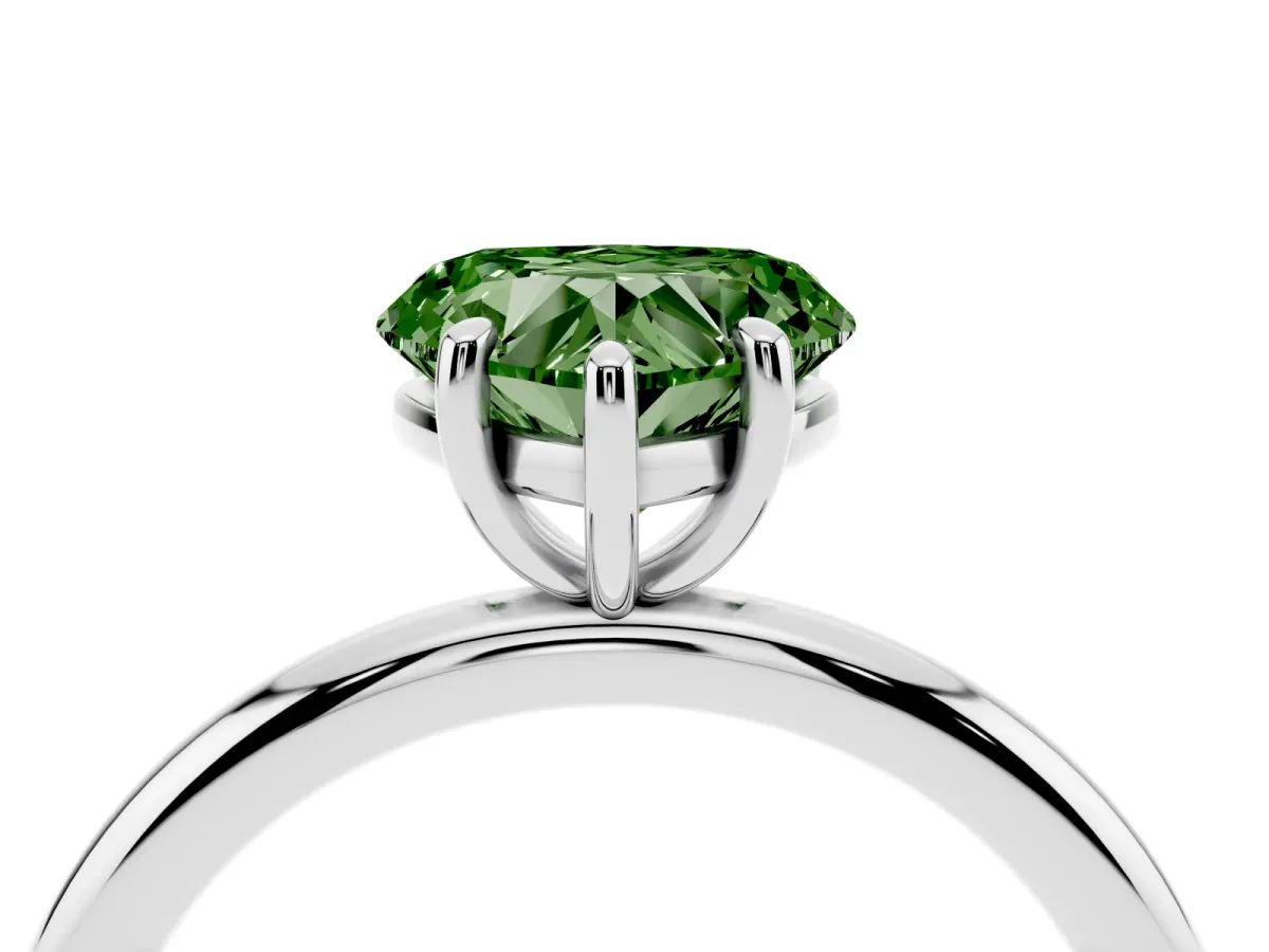 Fancy Green Heart Cut Solitaire Diamond Ring with Four-Prong Setting on a Plain Band Platinum