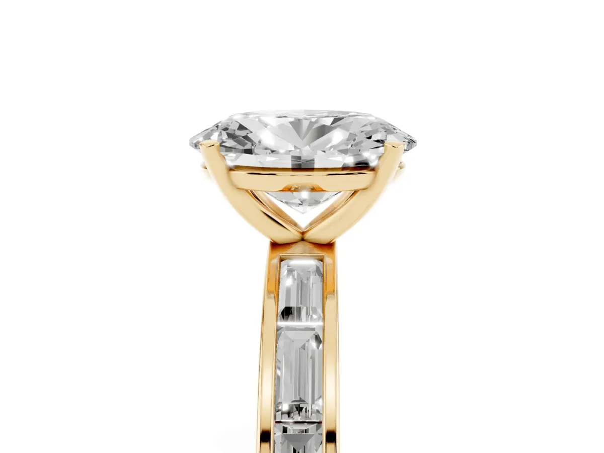 Oval Cut Solitaire Diamond Ring with Channel-Set Baguette Band and Four-Prong Setting Yellow gold