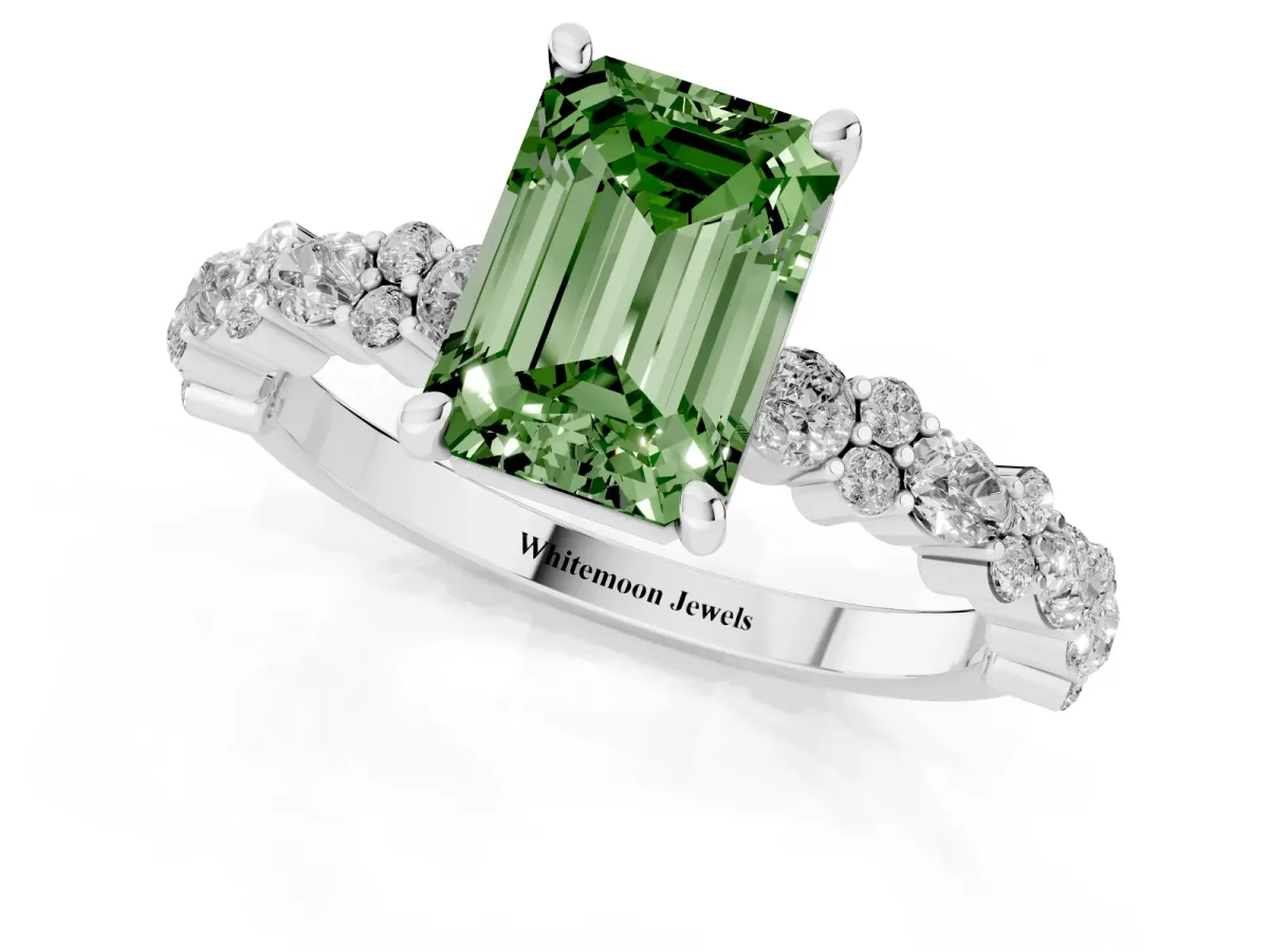 Fancy Green Emerald Cut Diamond Side Stone Solitaire Ring with Round and Four-Prong Setting Silver