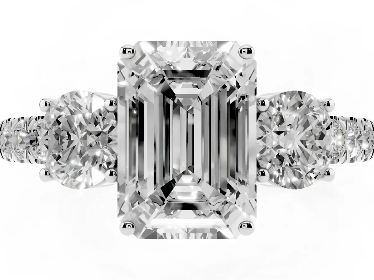 Emerald Cut Cut Diamond Three-Stone Ring with Round Side Stones and Pavé Band Platinum