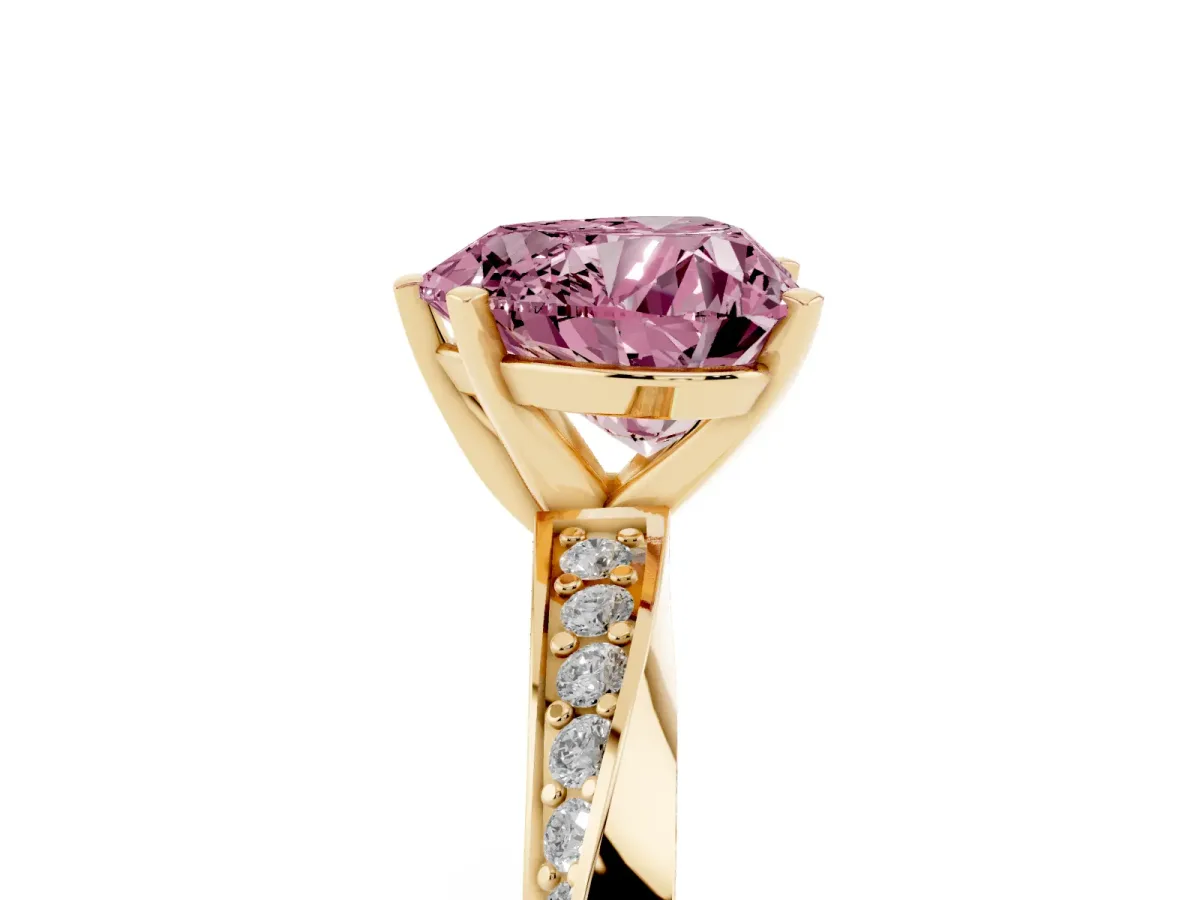 Fancy Pink Heart Cut Diamond Engagement Ring with Side Stone Accents and Four-Prong Setting Yellow gold