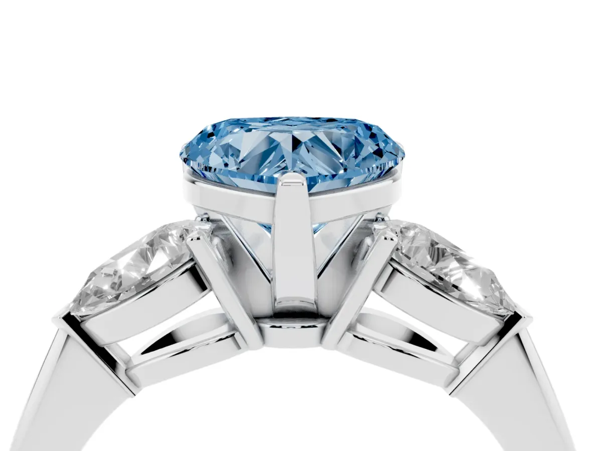 Fancy Blue Three-Stone Heart Cut Diamond Ring with Pear Side Stones and Four-Prong Setting Silver