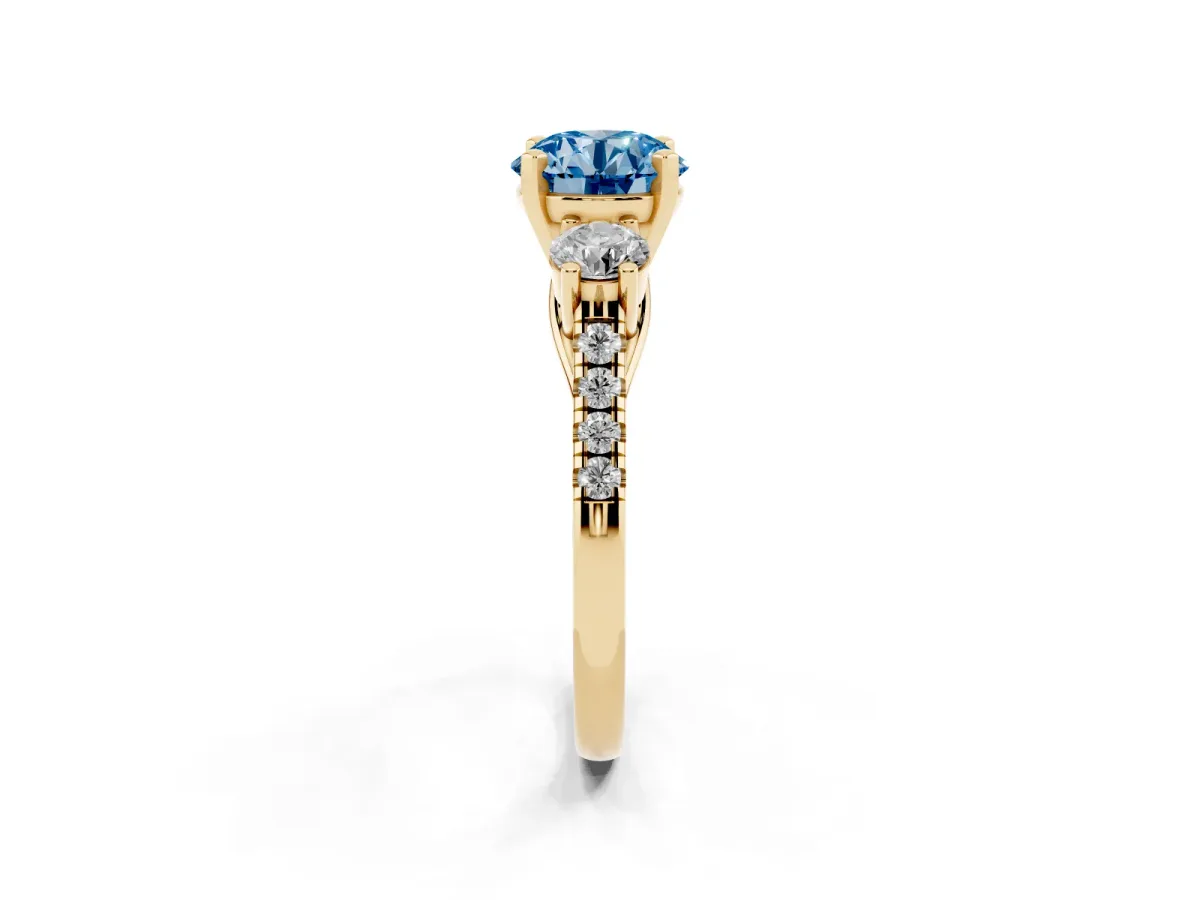 Fancy Blue Three-Stone Round Cut Diamond Pavé Band with Four-Prong Setting Yellow gold