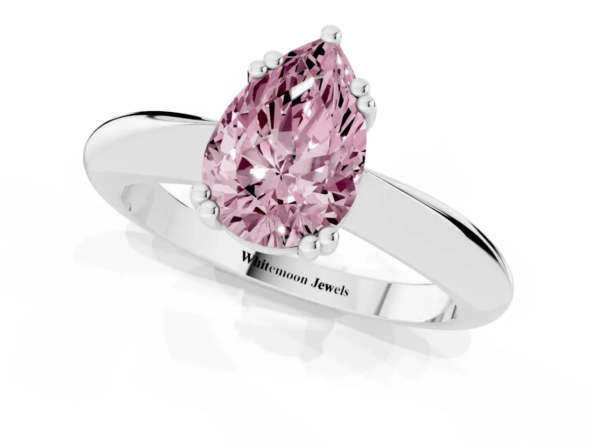 Fancy Pink Pear Cut Cut Solitaire Engagement Ring with Tapered Band and Four-Prong Setting White gold
