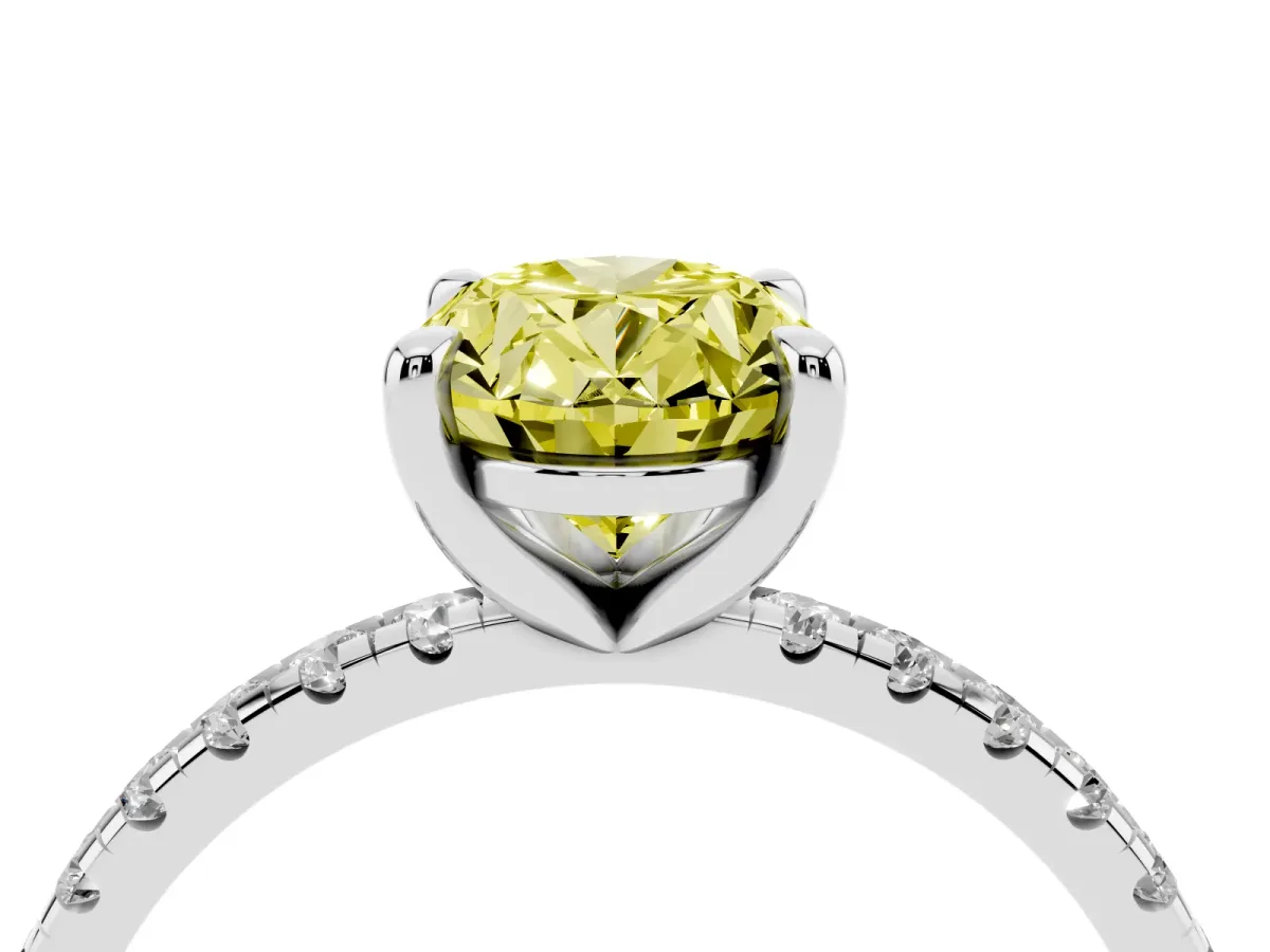 Fancy Yellow Oval Cut Diamond Brilliant Solitaire Ring with Pavé Band and Four-Prong Setting Silver
