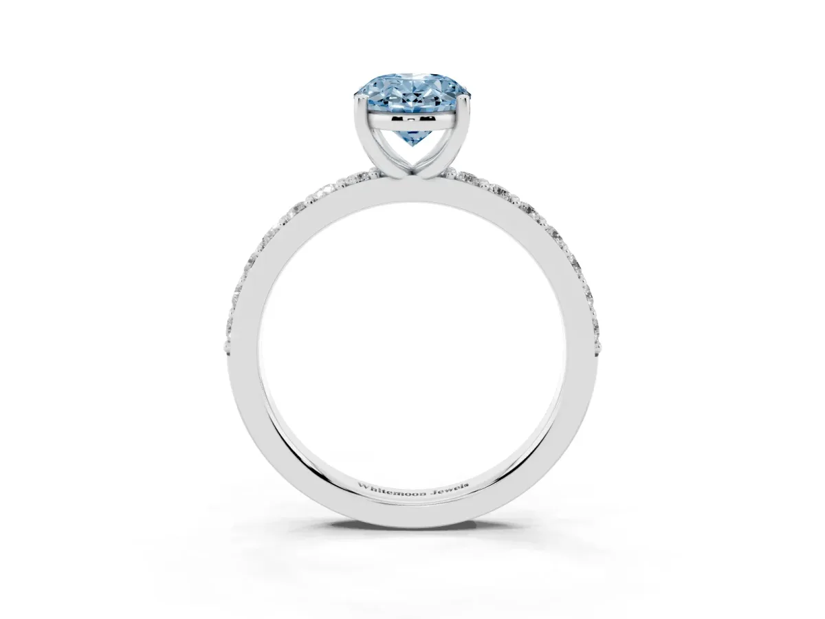Fancy Blue Oval Cut Cut Diamond Solitaire with Pave Band and Four-Prong Setting Silver