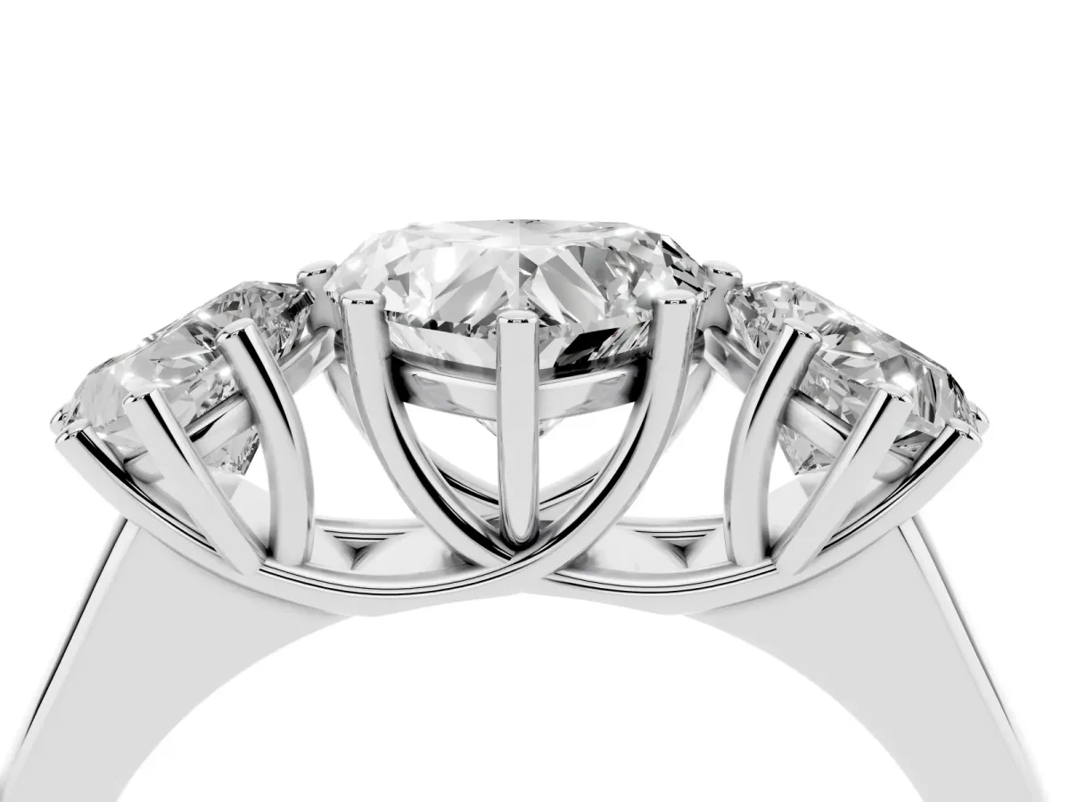 Heart Cut Three-Stone Diamond Ring with Prong Setting on a Classic Band White gold