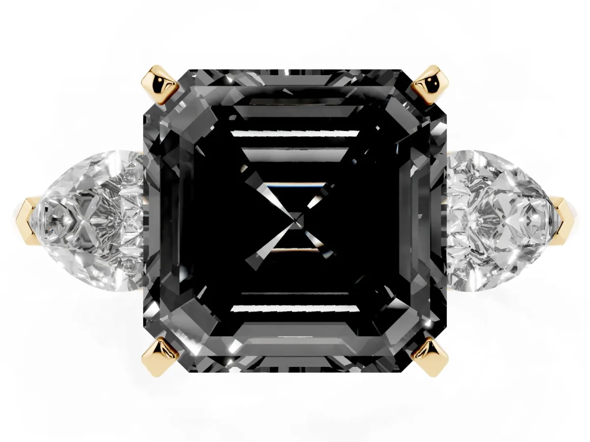 Fancy Black Three-Stone Asscher Cut Diamond Ring with Pear Side Stones and Four-Prong Setting Yellow gold