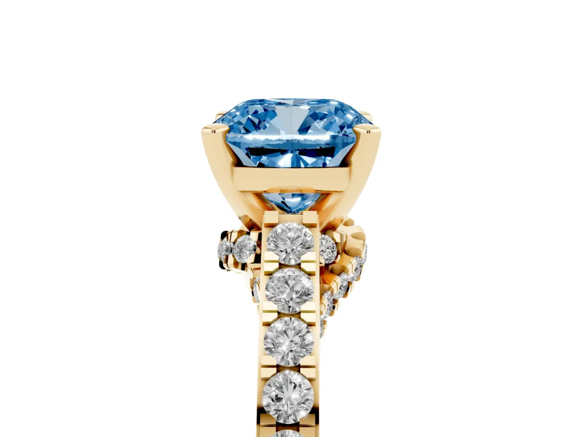 Fancy Blue Cushion Cut Diamond Solitaire Ring with Crossover Gallery and Round Pavé Band Yellow gold