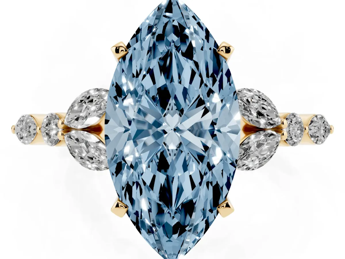 Fancy Blue Marquise Cut Diamond Solitaire Ring with Side Stones and Four-Prong Setting Yellow gold