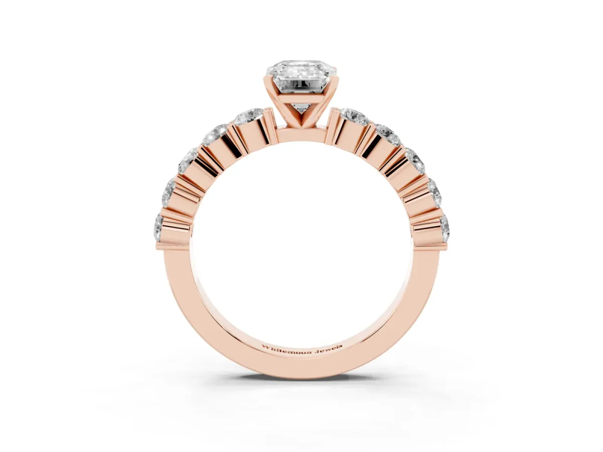 Emerald Cut Diamond Solitaire Ring with Shared Prong Round Side Stones Rose gold