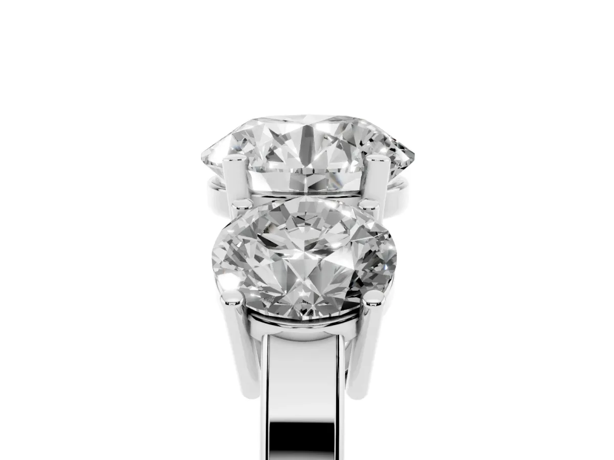 Three-Stone Round Cut Cut Diamond Engagement Ring with Flat Band and Four-Prong Setting Silver