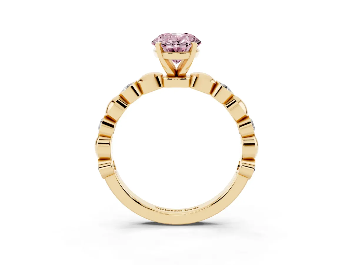 Fancy Pink Oval Cut Solitaire Bezel-Set Diamond Ring with Beaded Band and Four-Prong Setting Yellow gold