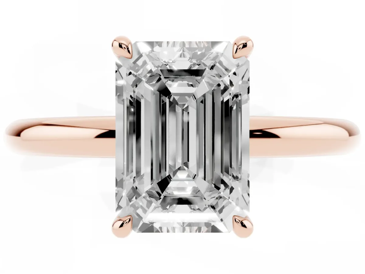 Emerald Cut Diamond Solitaire Ring with Thin Band and Four-Prong Setting Rose gold