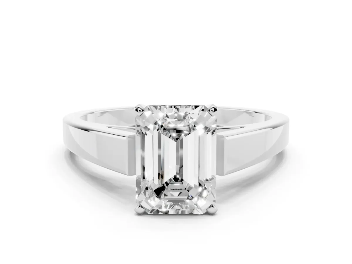 Emerald Cut Solitaire Engagement Ring with Four-Prong Setting and Tapered Band Silver
