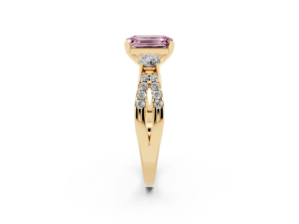 Fancy Pink Emerald Cut Diamond Three-Stone Ring with Pavé Split Shank and Four-Prong Setting Yellow gold