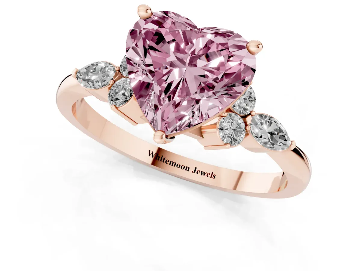 Fancy Pink Heart Cut Brilliant Diamond Solitaire Ring with Pear Side Stones and Four-Prong Setting Rose gold