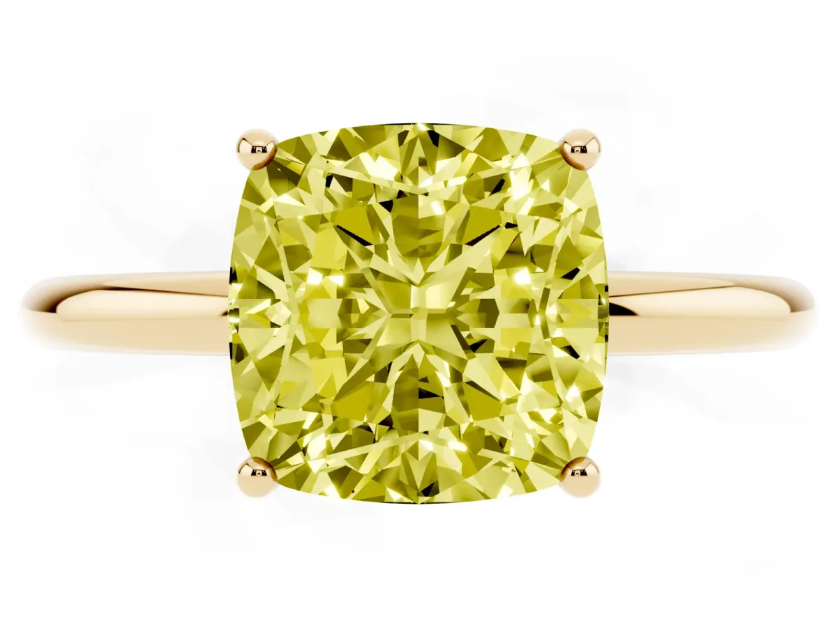 Fancy Yellow Cushion Cut Solitaire Diamond Ring with a Classic Band and Four-Prong Setting Yellow gold
