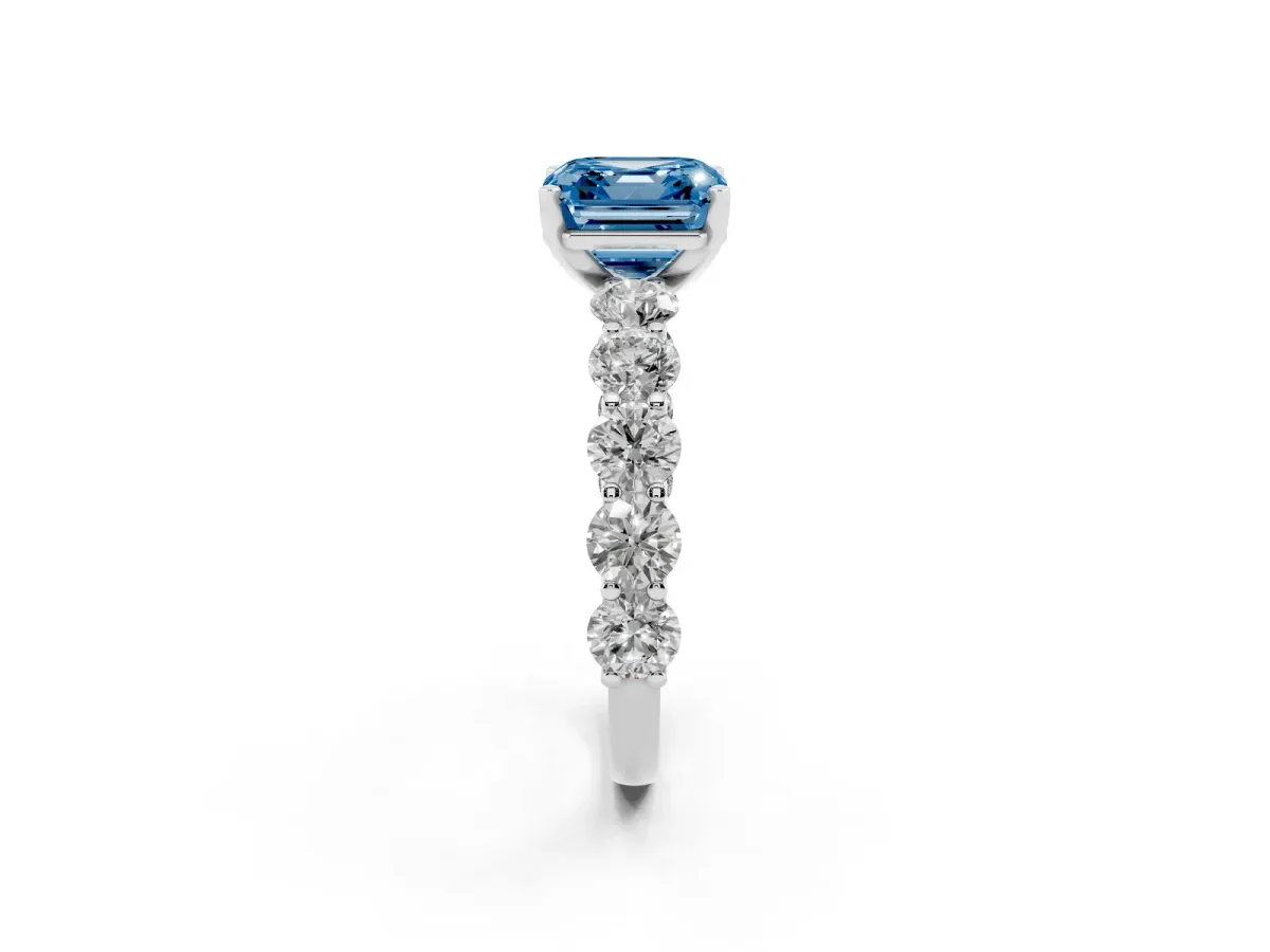 Fancy Blue Asscher Cut Diamond Prong Setting with Side Stones on a Pave Band Silver