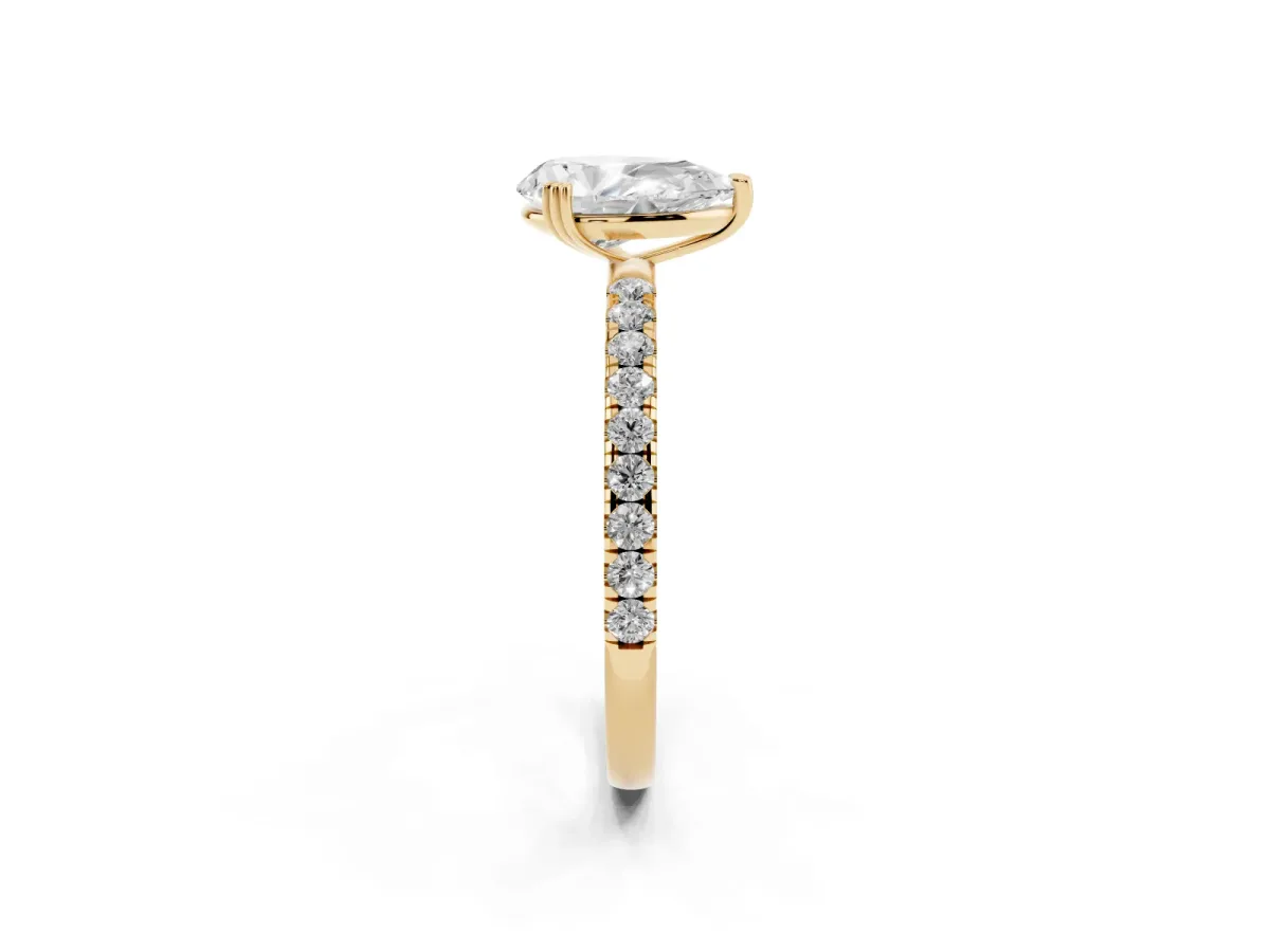 Pear Cut Brilliant Solitaire with Pavé Band and Claw Prong Setting Yellow gold