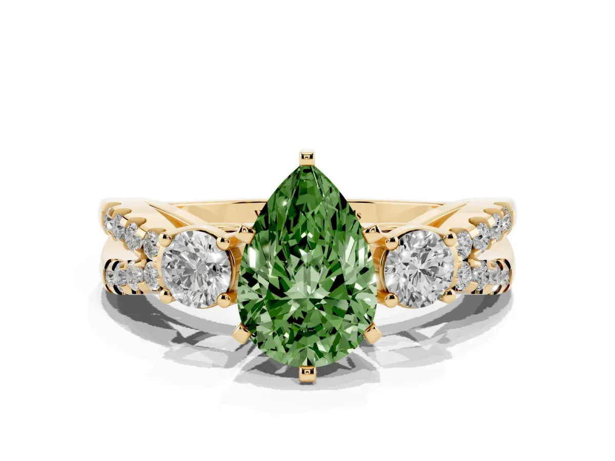 Fancy Green Pear Cut Diamond Three-Stone Ring with Pavé Split Shank and Four-Prong Setting Yellow gold