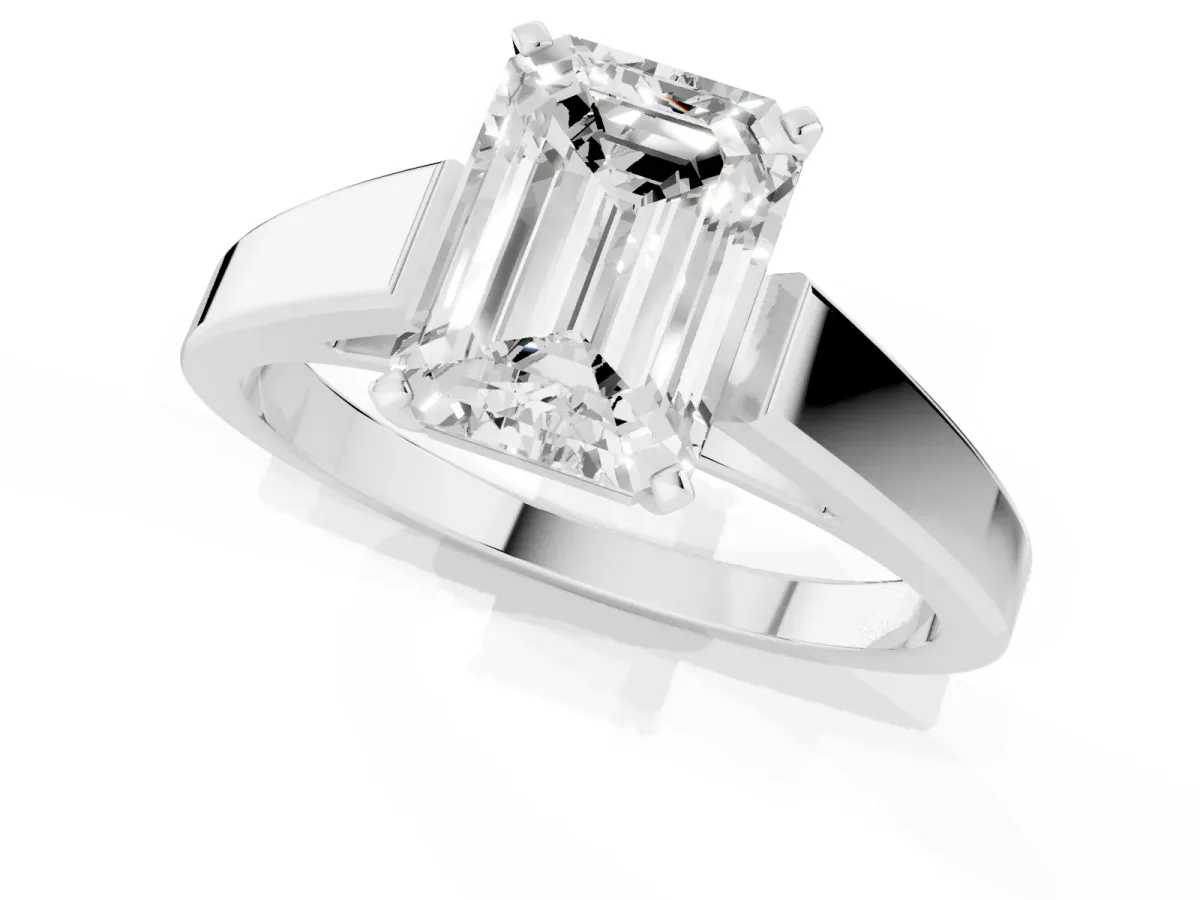 Emerald Cut Solitaire Engagement Ring with Four-Prong Setting and Tapered Band Silver